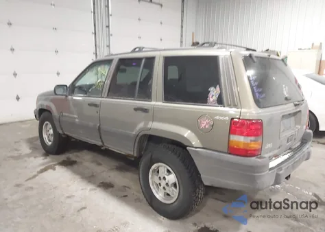 1997 Jeep Grand Cherokee Laredo/Tsi из США, поврежденный, VIN 1J4GZ58S3VC777456